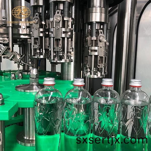 玻(bo)瓈(li)缾含(han)氣飲(yin)料灌裝(zhuang)機(ji)
